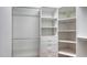 The walk-in closet has ample storage space with shelving, drawers, and hanging rods at 6905 Pine Valley St, Bradenton, FL 34202