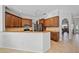 Modern kitchen with stainless appliances, granite countertops, breakfast bar, and plenty of storage space at 7115 39Th E Ln, Sarasota, FL 34243