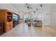 Comfortable living room features tile flooring, natural light, and a cozy seating arrangement with ample space at 7115 39Th E Ln, Sarasota, FL 34243