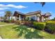 Exterior view of a clubhouse showcasing its architectural design, landscaping, and amenities for community enjoyment at 7130 Westhill Ct, Lakewood Ranch, FL 34202