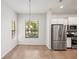 Bright breakfast nook with natural light and stainless steel appliances at 7130 Westhill Ct, Lakewood Ranch, FL 34202