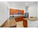 Kitchen featuring stainless steel appliances, granite countertops, and ample cabinet space at 7130 Westhill Ct, Lakewood Ranch, FL 34202