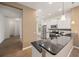 Modern kitchen featuring granite countertops and stainless steel appliances at 7130 Westhill Ct, Lakewood Ranch, FL 34202