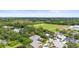 Aerial view of homes near athletic fields, blending residential living with recreational access at 7615 4Th Avenue Nw Dr, Bradenton, FL 34209