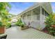 Backyard patio of home featuring an outdoor living space with a screened porch at 7615 4Th Avenue Nw Dr, Bradenton, FL 34209