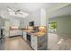 Well lit kitchen with views to the outdoor balcony at 7615 4Th Avenue Nw Dr, Bradenton, FL 34209