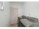 Laundry room with modern washer and dryer at 7615 4Th Avenue Nw Dr, Bradenton, FL 34209