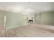 Spacious living area boasting sleek floors, a piano, and a unique skylight at 7615 4Th Avenue Nw Dr, Bradenton, FL 34209