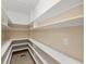 Walk-in pantry featuring several shelves at 7615 4Th Avenue Nw Dr, Bradenton, FL 34209