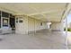 Spacious carport provides covered parking and entry to this charming home at 8470 Imperial Cir, Palmetto, FL 34221