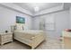 Bedroom with natural light, tile floors, and a tray ceiling at 1000 San Lino Cir # 1032, Venice, FL 34292
