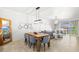 Dining room featuring a wooden table and views of the living room at 1000 San Lino Cir # 1032, Venice, FL 34292