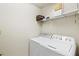 Functional laundry room with modern washer and dryer at 1000 San Lino Cir # 1032, Venice, FL 34292
