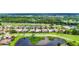 The golf course community boasts ponds, landscaping, and serene views from above at 1017 Tuscany Blvd, Venice, FL 34292