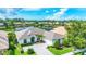 A beautiful exterior elevation of a single-Gathering home in a desirable golf course community at 1017 Tuscany Blvd, Venice, FL 34292