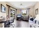 Office space with a view of the golf course and pool from the sliding glass doors at 1017 Tuscany Blvd, Venice, FL 34292