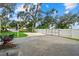 Spacious backyard featuring a large brick-paved area, perfect for outdoor activities at 112 17Th E St, Bradenton, FL 34208