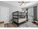 Bedroom with bunk beds, natural light, and a minimalist design at 112 17Th E St, Bradenton, FL 34208