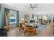 Open-concept living room features modern decor, stylish furniture, and lots of natural light at 112 17Th E St, Bradenton, FL 34208