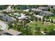 Community aerial view featuring a pool, green space, playground and residential homes at 11223 Spring Gate Trl, Bradenton, FL 34211