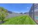 Spacious backyard featuring manicured lawn, providing an ideal space for outdoor activities and relaxation at 11223 Spring Gate Trl, Bradenton, FL 34211