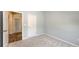 Inviting bedroom featuring multiple doorways, neutral walls and plush carpet at 11223 Spring Gate Trl, Bradenton, FL 34211