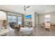 Spacious living room and dining area with plenty of natural light and access to the screened lanai at 11223 Spring Gate Trl, Bradenton, FL 34211