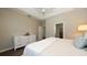 Comfortable main bedroom with hardwood floors and en-suite bathroom at 11223 Spring Gate Trl, Bradenton, FL 34211