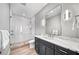 Contemporary bathroom featuring a glass-enclosed shower and sleek vanity at 119 Avenida Messina, Sarasota, FL 34242