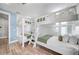 Charming bunk room featuring multiple beds, custom built-ins, and playful decor at 119 Avenida Messina, Sarasota, FL 34242