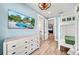 Bright bunk room with a mounted TV and convenient access to other rooms in the home at 119 Avenida Messina, Sarasota, FL 34242