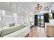 Comfortable bunk room with private balcony access, modern finishes, and lots of natural light at 119 Avenida Messina, Sarasota, FL 34242