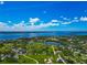 Stunning aerial shot of homes with waterfront access, showcasing a tranquil coastal lifestyle with breathtaking water views at 1230 Bayshore Dr, Terra Ceia, FL 34250