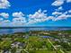 Breathtaking aerial perspective offering water views, natural landscape and a glimpse of the community at 1230 Bayshore Dr, Terra Ceia, FL 34250