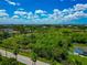 Scenic aerial capturing lush surroundings, waterfront homes, and water views, defining coastal lifestyle at 1230 Bayshore Dr, Terra Ceia, FL 34250