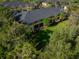 Overhead view of townhomes with a spacious backyard, perfect for outdoor enjoyment and relaxation at 13084 Tigers Eye Dr, Venice, FL 34292