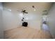 Spacious bonus room featuring wood-look floors, recessed lighting and ceiling fan at 13084 Tigers Eye Dr, Venice, FL 34292