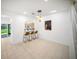 Inviting dining area showcasing a view to an arched opening, and open staircase at 13084 Tigers Eye Dr, Venice, FL 34292