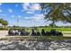 Line of golf carts parked by the golf course, ready for a day on the green at 1415 Millbrook Cir, Bradenton, FL 34212