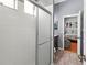 Bathroom featuring shower, toilet and vanity and doorway to the next bedroom at 1508 86Th Nw Ct, Bradenton, FL 34209