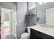 Bathroom boasts a shower, toilet and sink with granite counter and access to the pool area at 1508 86Th Nw Ct, Bradenton, FL 34209