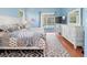 Bright bedroom with en-suite bath and access to the pool area at 1508 86Th Nw Ct, Bradenton, FL 34209