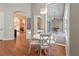 This breakfast nook offers natural light and views of the outdoor entertaining area at 1508 86Th Nw Ct, Bradenton, FL 34209