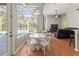 Breakfast nook that connects to living room, overlooking pool at 1508 86Th Nw Ct, Bradenton, FL 34209