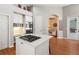 Bright, updated kitchen featuring an island with gas cooktop and stainless steel appliances at 1508 86Th Nw Ct, Bradenton, FL 34209
