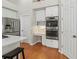 This kitchen features stainless steel appliances, built-in oven, and adjacent desk area at 1508 86Th Nw Ct, Bradenton, FL 34209
