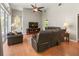 Spacious living room featuring hardwood floors, high ceilings, and comfortable seating at 1508 86Th Nw Ct, Bradenton, FL 34209