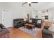 Bright and open living room with wood floors and comfortable seating at 1508 86Th Nw Ct, Bradenton, FL 34209