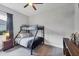 Cozy bedroom featuring a bunk bed with two mattresses, and a window to allow natural light at 16038 39Th E Gln, Parrish, FL 34219