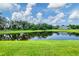 Enjoy the water view from the backyard of this lovely home at 16038 39Th E Gln, Parrish, FL 34219